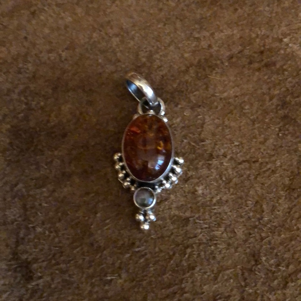 Sterling Silver pendant with amber glass